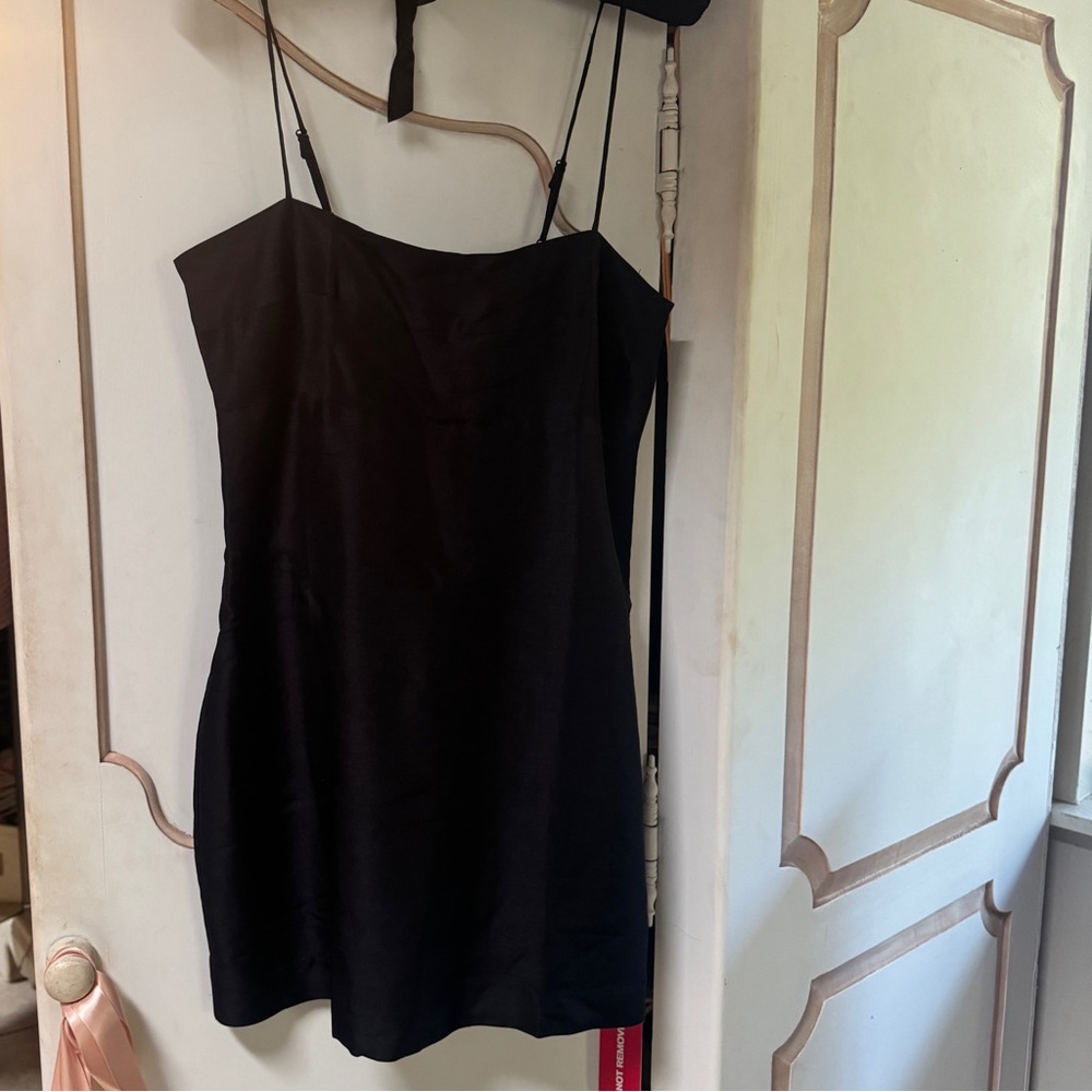 The Christy dress in black silk Realisation Par